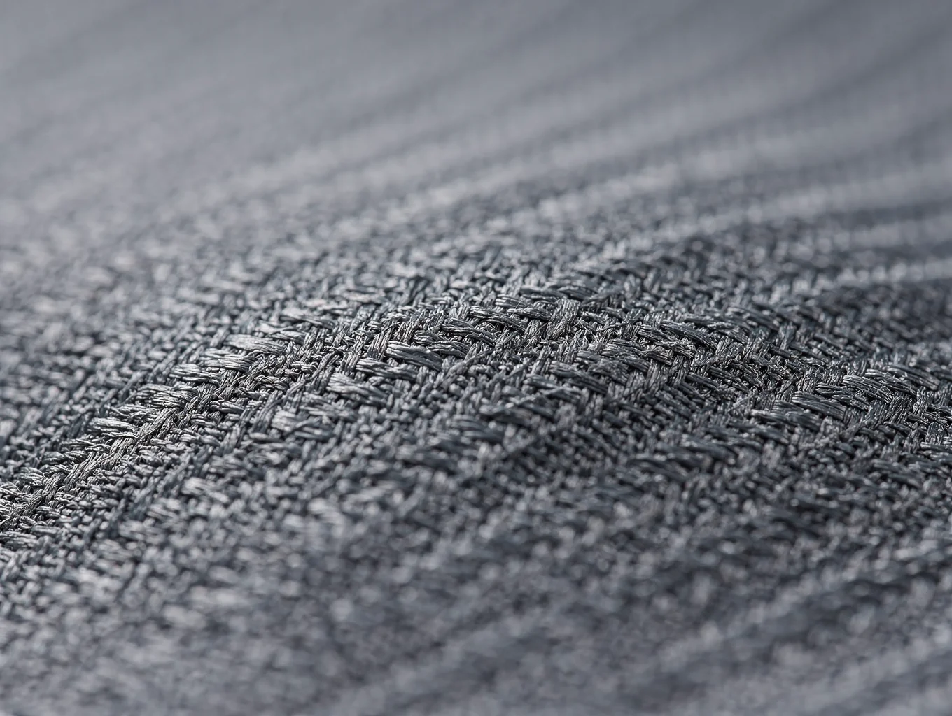 Silicone thermal channel bonding layered on dark performance textile